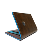 Load image into Gallery viewer, Shibizhi Wallet, Part of the Diné Bikéyah-Made Line. Full Grain Leather with Silver Button. Made in the Navajo Nation.