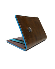 Load image into Gallery viewer, Shibizhi Wallet, Part of the Diné Bikéyah-Made Line. Full Grain Leather with Silver Button. Made in the Navajo Nation.
